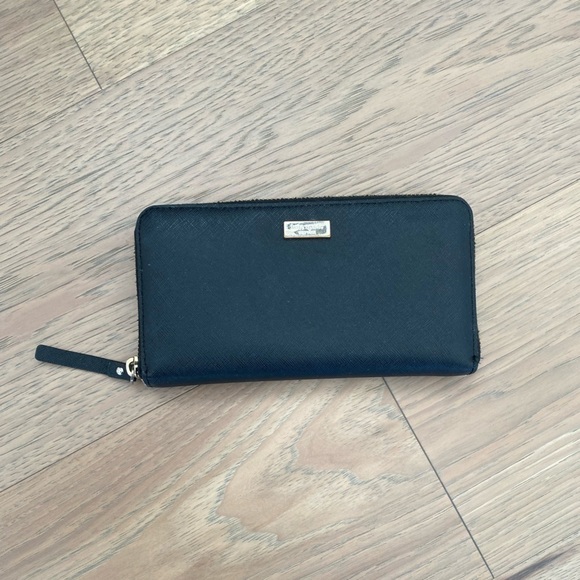 kate spade Handbags - Kate Spade Black Large Continental Zip Around Colorful Striped Interior Wallet